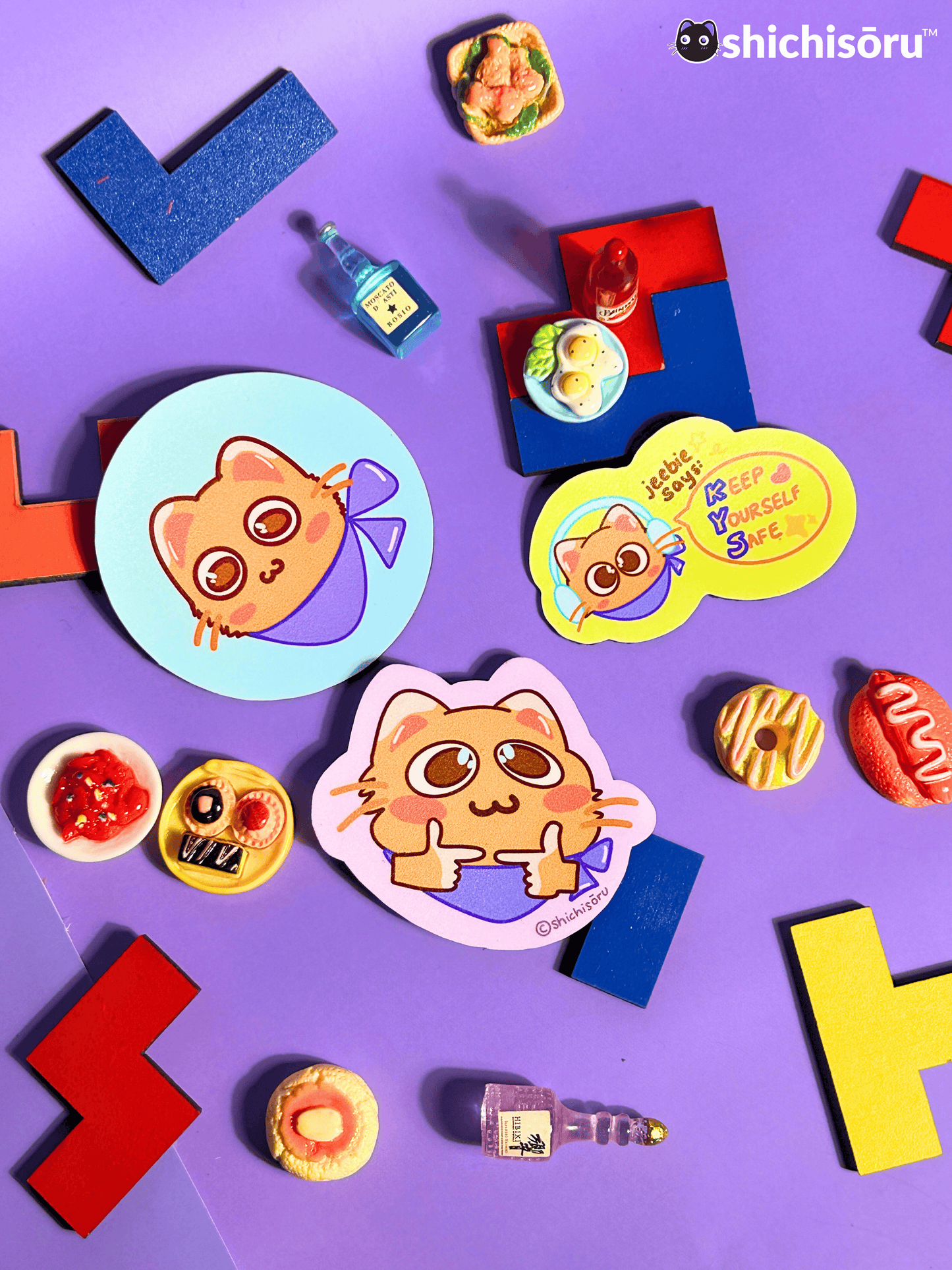 Colorful stickers on a purple background with shichisoru branding.